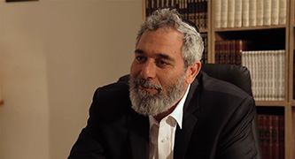 Haredi with a background of holy books