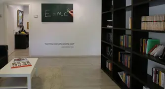 Library white table and wall with picture